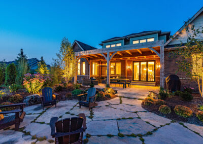 Evening back yard and patio landscape design in East Garafraxa by Tumber & Associates